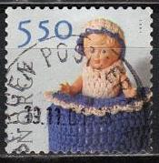 Timbre: Poup&eacute;e dans un panier